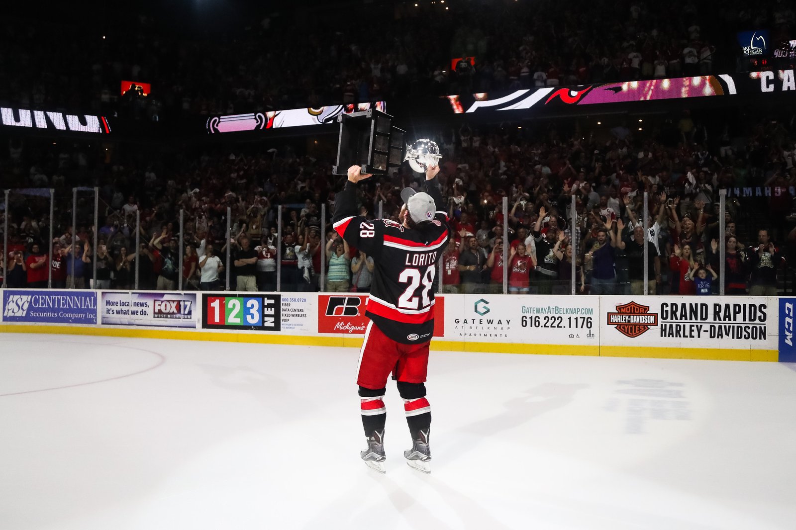 Hockey player holding the Calder Cup